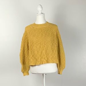 Knitted yellows sweater